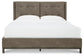 Wittland King Upholstered Panel Bed with Mirrored Dresser